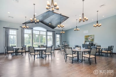 Bright dining room with tables and chairs