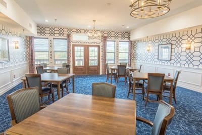 Bright dining room with tables and chairs