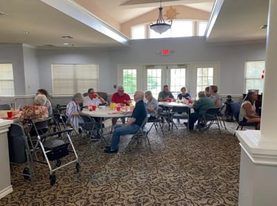 Residents enjoying a social gathering in a common area