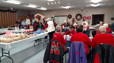 Residents enjoying a festive gathering with food.
