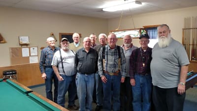 Group of male residents posing in a common area