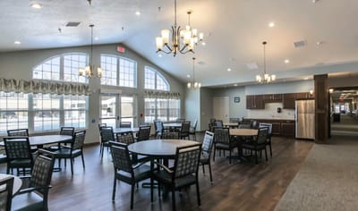 Bright dining area with tables and chairs
