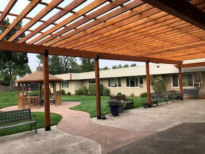 Outdoor courtyard with seating and gazebo