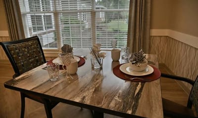 Set dining table in a well-lit room