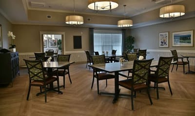 Interior view of a common area with tables and chairs