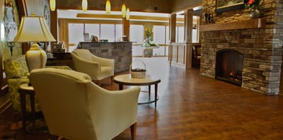 Interior view of a cozy common area with seating