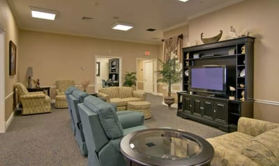 Common area with seating and a television