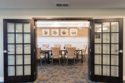 Dining area with tables and chairs set up
