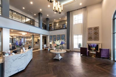 Bright lobby area with elegant decor and seating