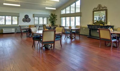 Interior view of a dining area with tables and chairs