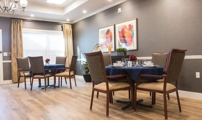 Elegant dining area with tables set for meals