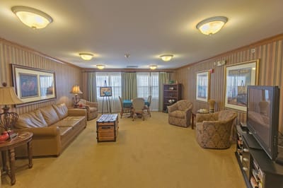 Bright common area with seating and decor