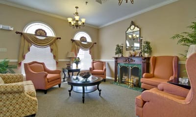 Cozy common area with seating and a fireplace