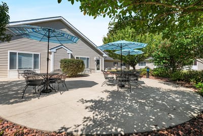 Outdoor seating area with umbrellas and tables