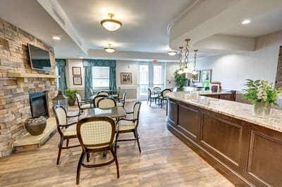 Common area with a fireplace and seating