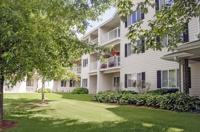 Exterior view of a residential building with greenery