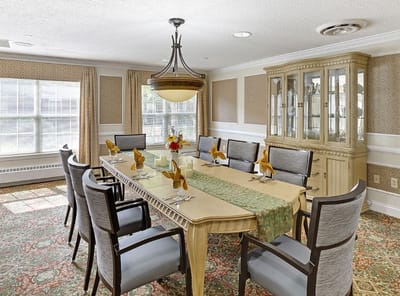 Elegant dining room setup with table and chairs