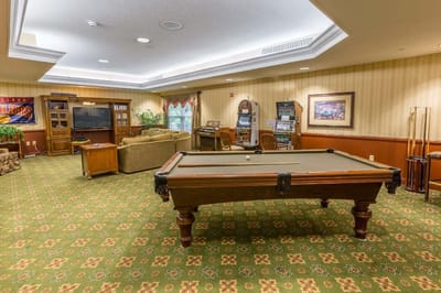 Common area with pool table and seating