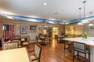 Bright dining area with tables and chairs