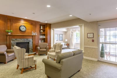 Cozy lobby area with seating and fireplace