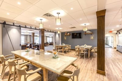 Bright dining area with tables and chairs