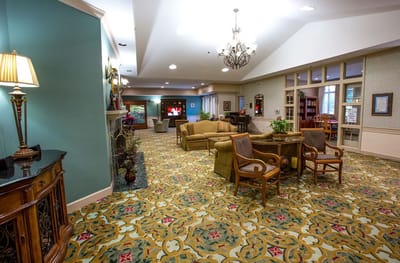 Interior common area with seating and decorative carpet