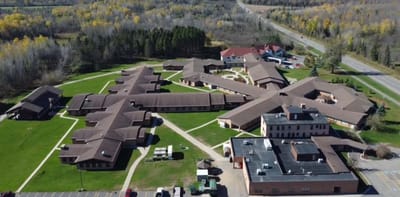 Aerial view of the nursing home facility surrounded by greenery