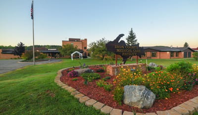 Front entrance of Iron County Medical Care Facility with landscaping