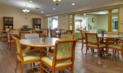 Interior dining area with tables and chairs