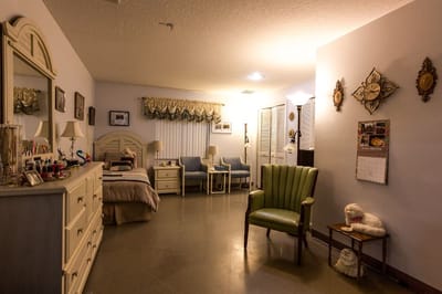 Cozy private resident room with furniture and decor