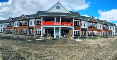 Exterior view of a senior living facility under construction