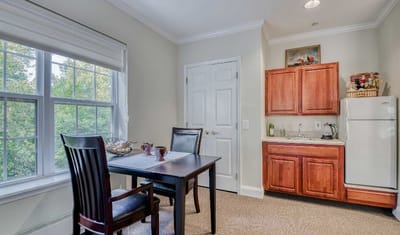 Private resident room with dining area and kitchenette