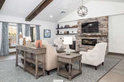 Cozy common area with seating and fireplace