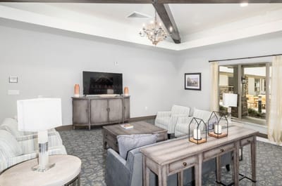 Bright common area with seating and decor