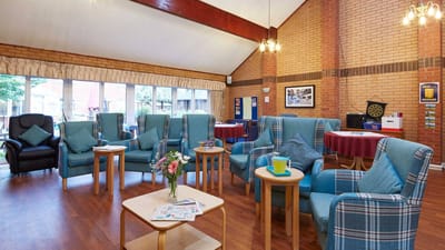 Common area with seating and flowers on a table