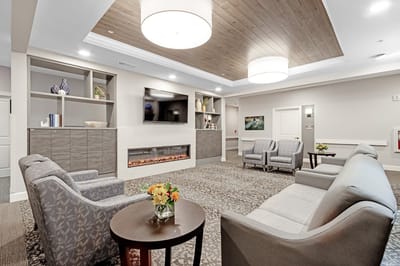 Bright common area with comfortable seating and decor