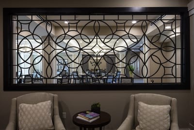 Interior view of a common area with decorative window