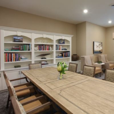 Bright communal space with bookshelves and seating