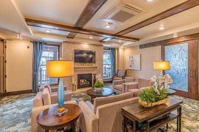 Cozy common area with seating and fireplace