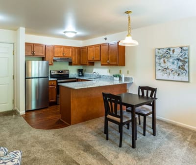 Cozy kitchen area in a senior living apartment