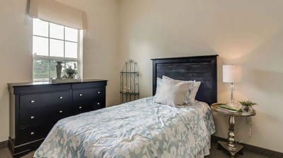 Bright private bedroom with light decor