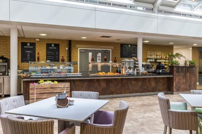 Modern dining area with food service counter