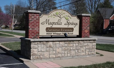 Sign for Magnolia Springs Senior Living facility