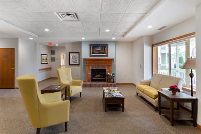 Interior lounge area with seating and a fireplace