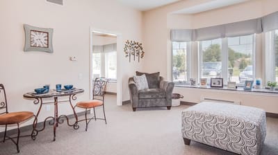 Bright interior common area with seating and decor