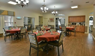 Dining area with tables set for a meal