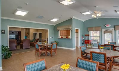 Dining area with tables and chairs in a common space