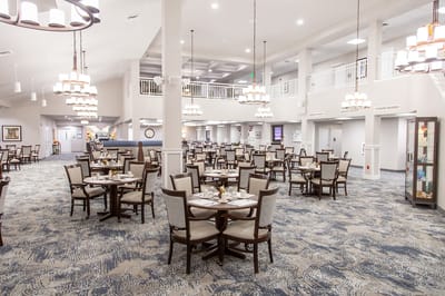 Dining area with tables set for a meal