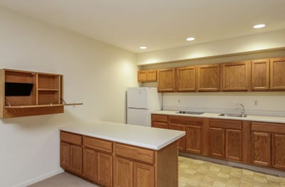 Interior kitchen space with wooden cabinets