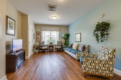 Bright common area with seating and décor